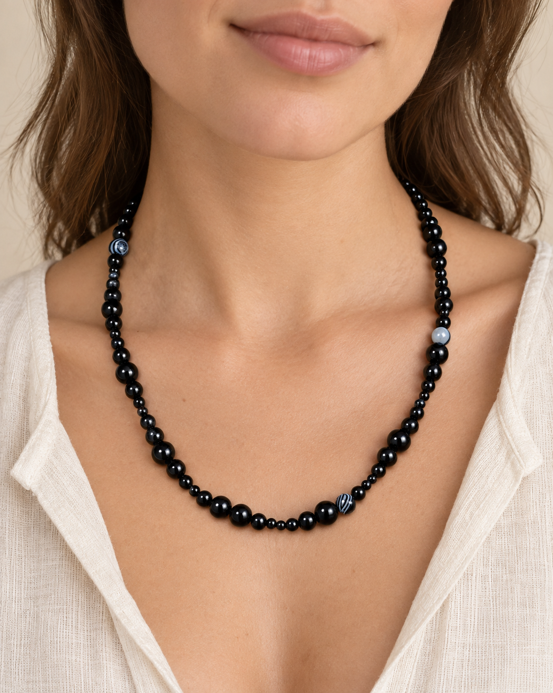 Graphic Black Bead Necklace shown worn for scale.