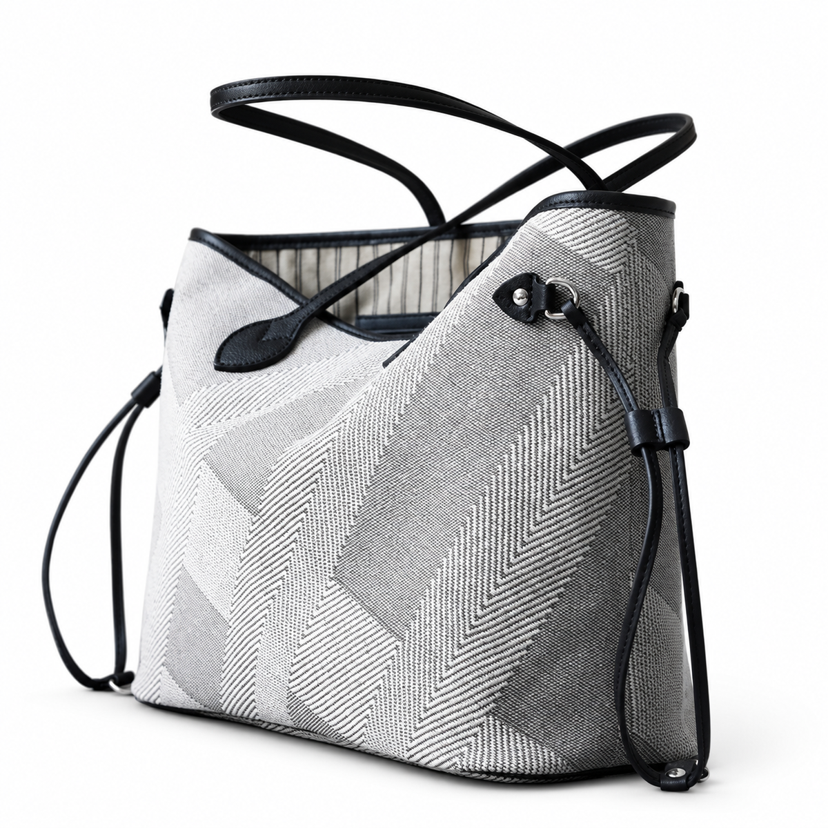 Grey geometric tote with black crossed handles and adjustable side ties.