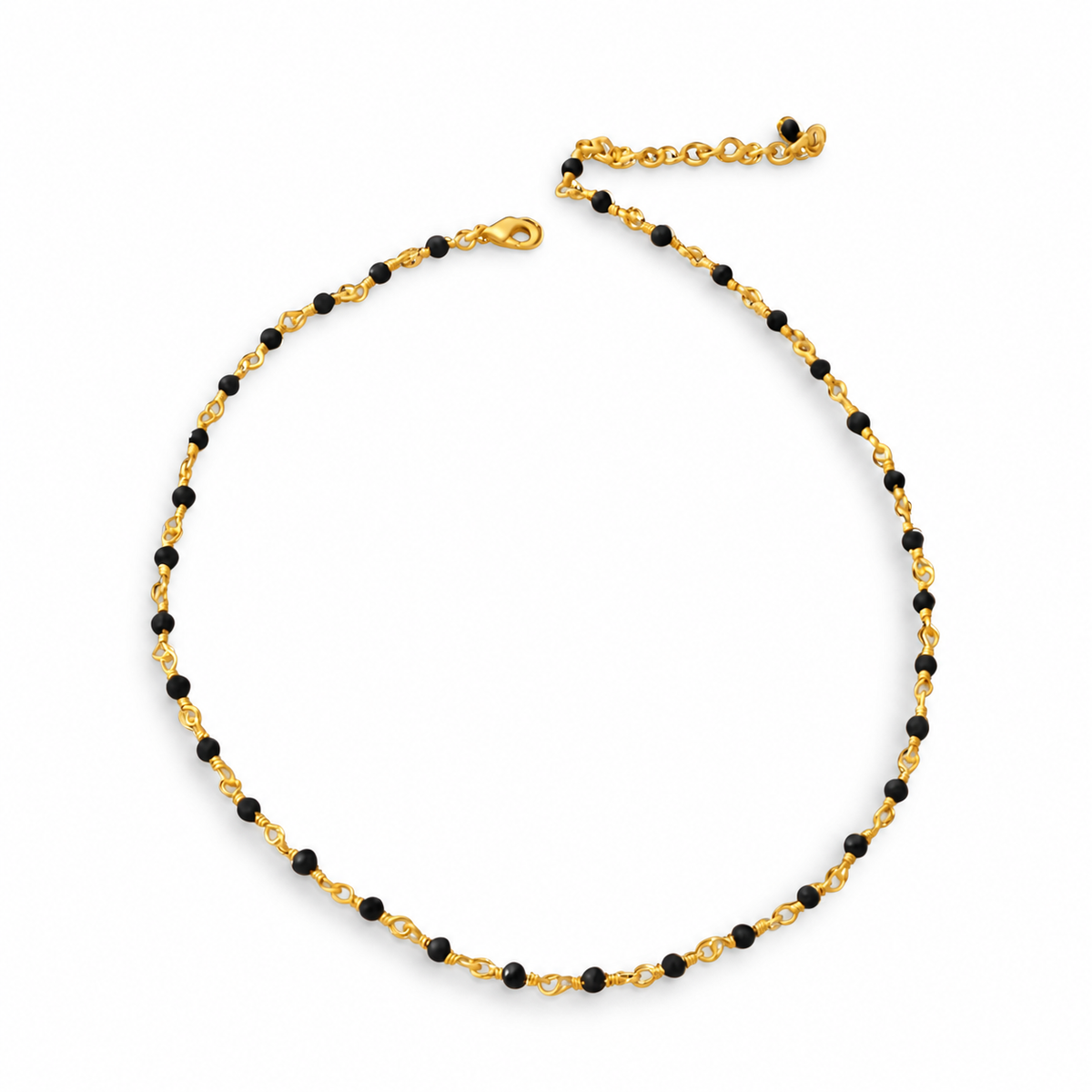Black beaded necklace with gold-tone links, a lobster clasp and extension chain.
