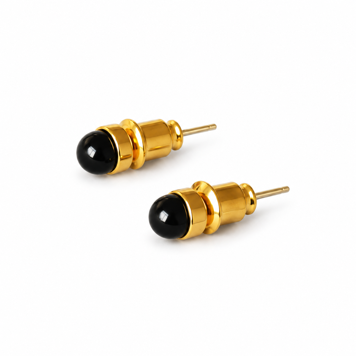 Black domed stud earrings with gold-tone rims and straight posts.