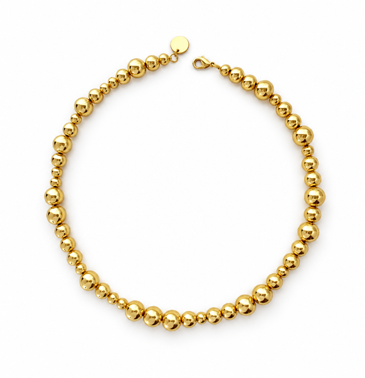Gold-tone ball necklace with varied bead sizes, a round tag and lobster clasp.