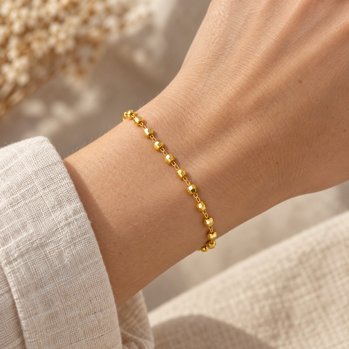 Beaded Ball Chain Bracelet shown worn on a wrist.