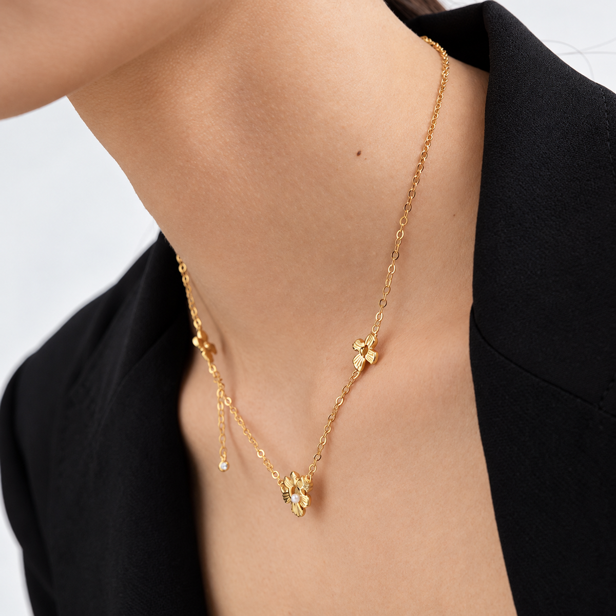 Daisy Flower Necklace, Bracelet & Earrings Set worn in a close-up detail view