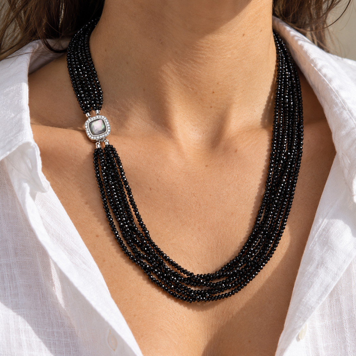 Black Spinel Pearl Layered Necklace worn at the neckline, showing layered strands and side clasp